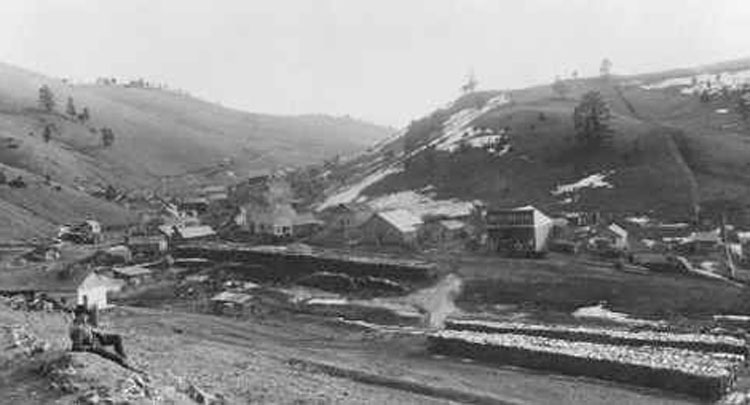 The smelter looms over the mining camp of Gregory, roughly 25 miles from Helena, Montana