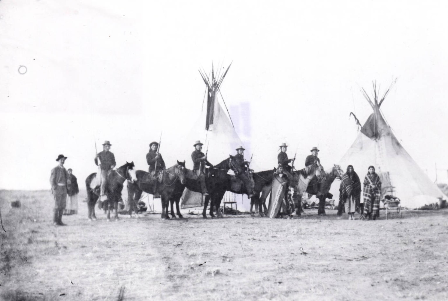 Six Crow Scouts outside Fort Custer, Late 19th Century